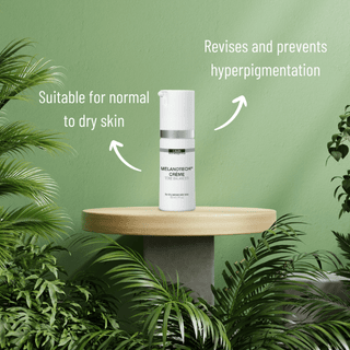 DMK Melanotech Cream bottle on a wooden stand with botanical greenery and product information