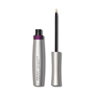 Nouveau Lashes triple enhance with black tip and purple cap on a white background