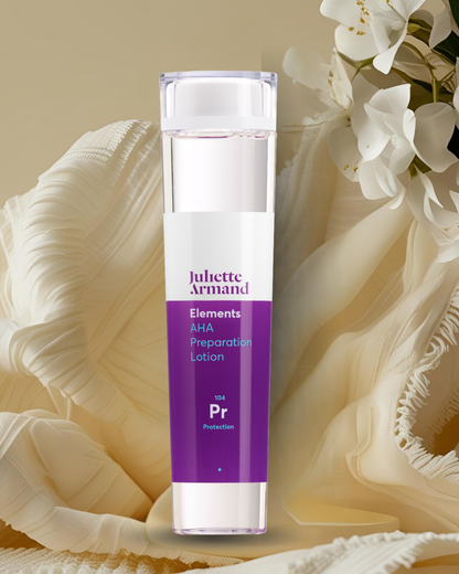 Skincare bottle labeled 'Juliette Armand on a decorative background with flowers.