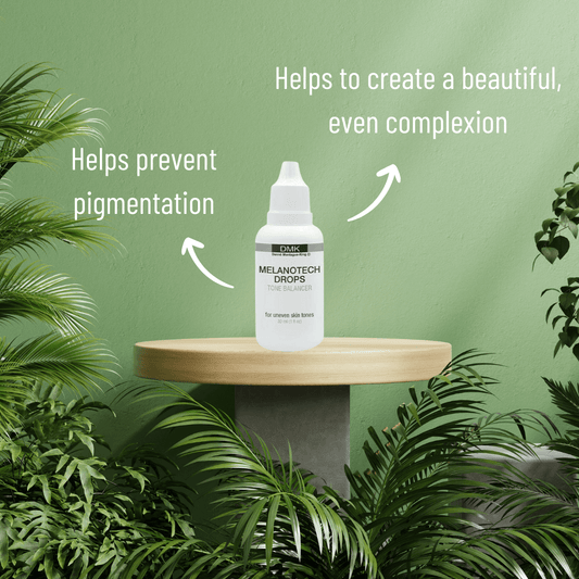 DMK Melanotech Drops bottle on a wooden stand with botanical greenery and product information