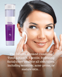 Woman applying toner with a bottle of Juliette Armand Cleansing Tonic Lotion on a light gray background