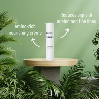 DMK Pro Amino Cream bottle on a wooden stand with botanical greenery and product information
