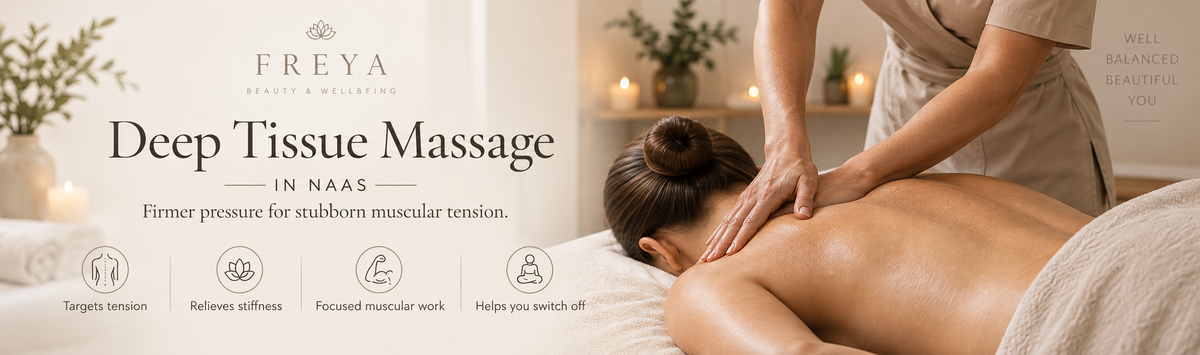 A spa advertisement for Freya Deep Tissue Massage in NAAS, showing a therapist massaging a client's back on a treatment table with warm candles in the background.