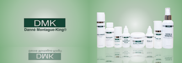 DMK skincare products on a green background