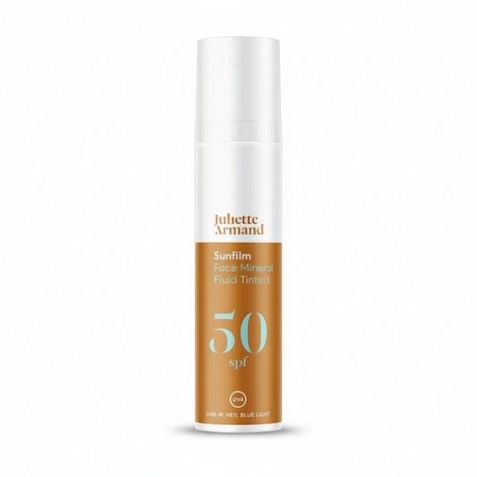 Juliette Armand Sunfilm Face Mineral Fluid Tinted bottle with SPF 50 on a white background
