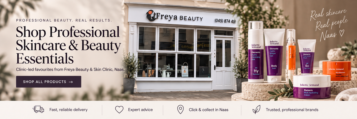 Promotional banner for Freya Beauty skincare products, featuring a storefront exterior and several cosmetic bottles, tubes, and jars arranged in front. Large text reads 'Shop Professional Skincare & Beauty Essentials' with Freya Beauty branding visible on the store sign and product packaging.