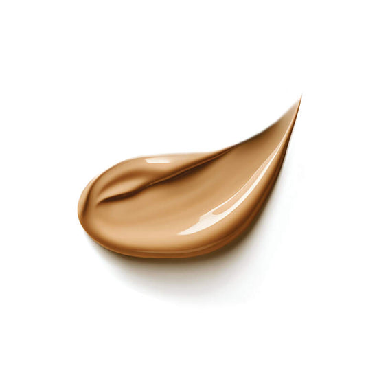 Beige cosmetic cream swatch on a white background