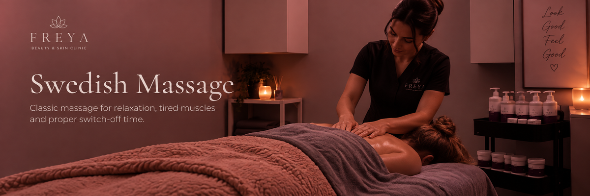 A spa scene showing a woman receiving a Swedish massage on a treatment table, with a therapist standing beside her. The room has warm ambient lighting, candles, bottles on a shelf, and large text reading 'FREYA' and 'Swedish Massage' on the left side.