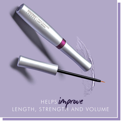 Lash serum with applicator on a purple background