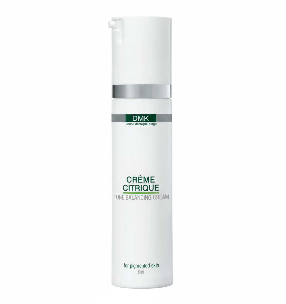 A pump bottle of DMK Crème Citrique, a brightening moisturizer for oily or uneven skin.
