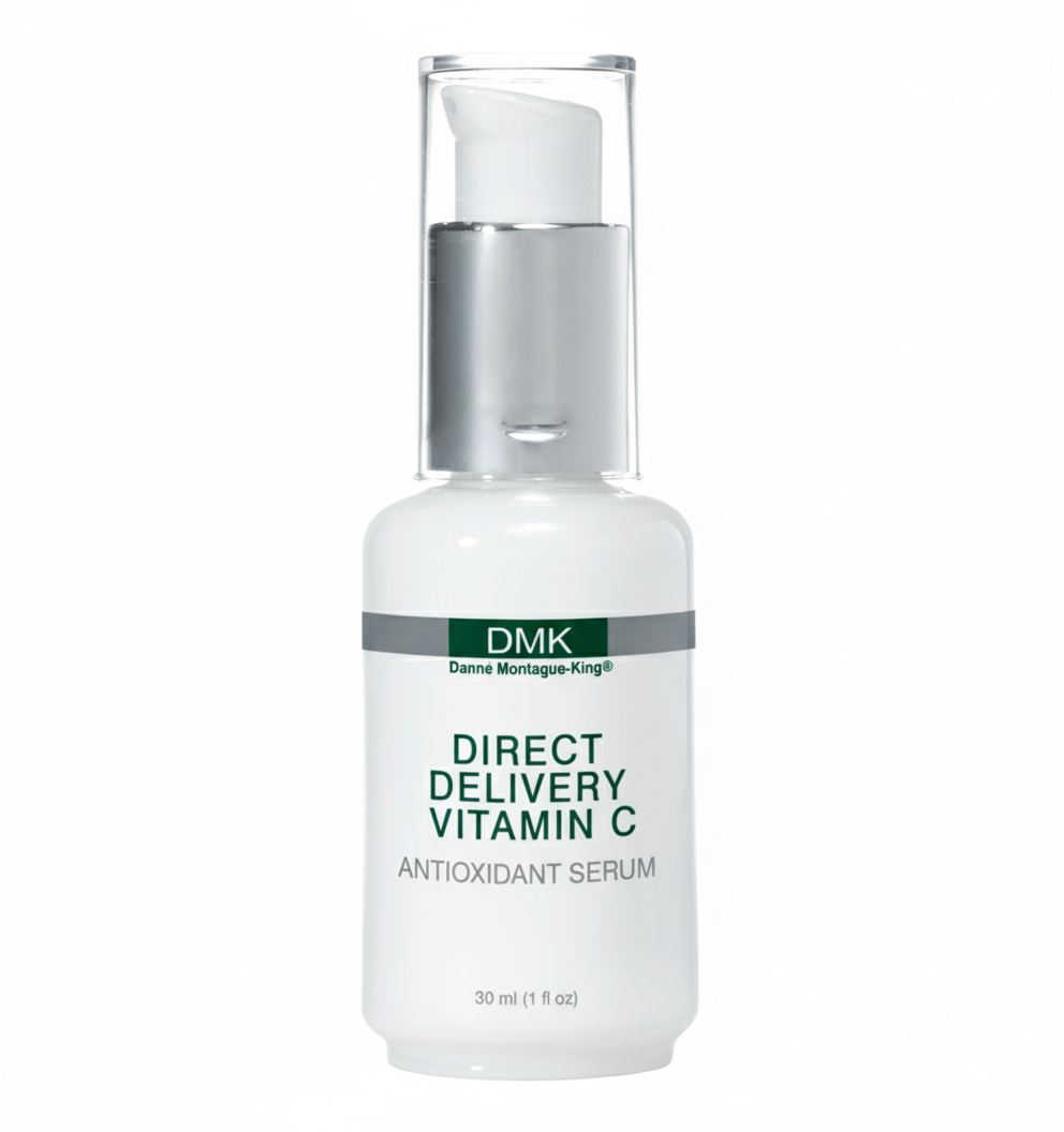 A white, pump-mounted bottle labeled 'DMK Direct Delivery Vitamin C Antioxidant Serum' against a plain background.