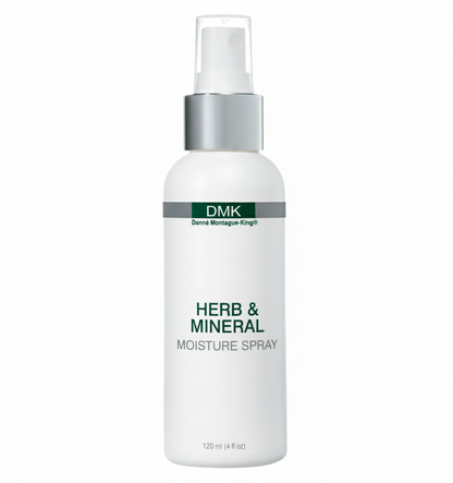 A white spray bottle labeled Herb & Mineral Moisture Spray by DMK.