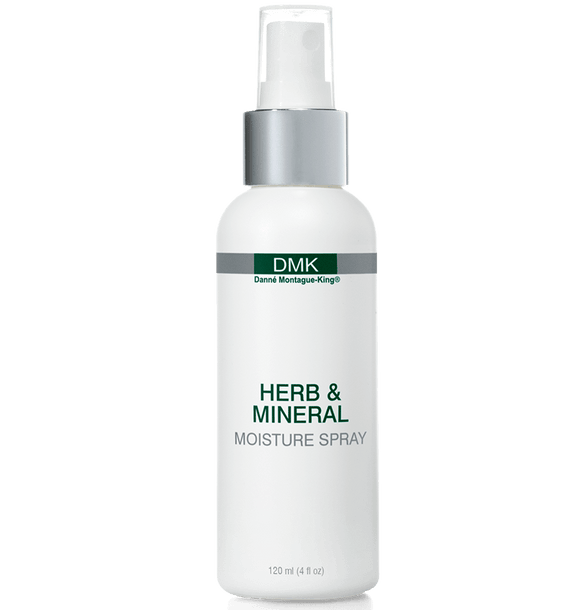 A white spray bottle labeled Herb & Mineral Moisture Spray by DMK.
