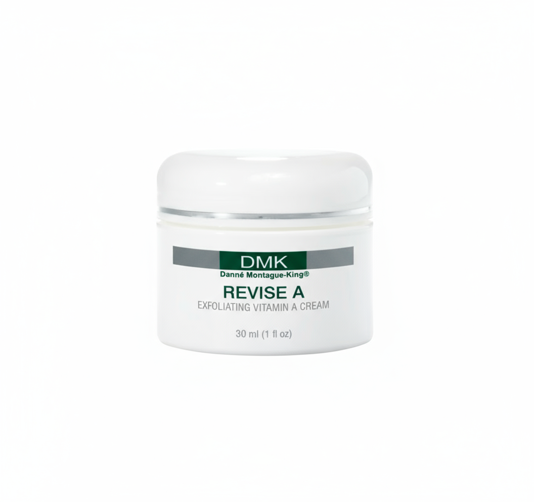 A jar of DMK Revise A Exfoliating Vitamin A Cream with a white and green label, indicating the product is for skin care.