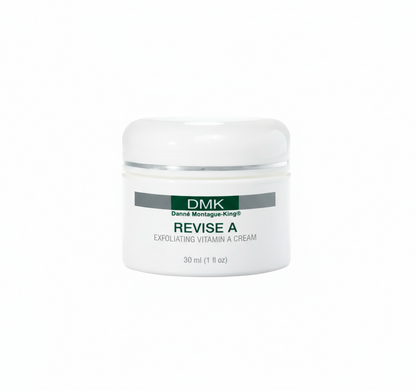 A jar of DMK Revise A Exfoliating Vitamin A Cream with a white and green label, indicating the product is for skin care.