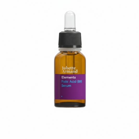 A bottle of Juliette Armand Folic Acid (B9) Serum with a dropper cap.