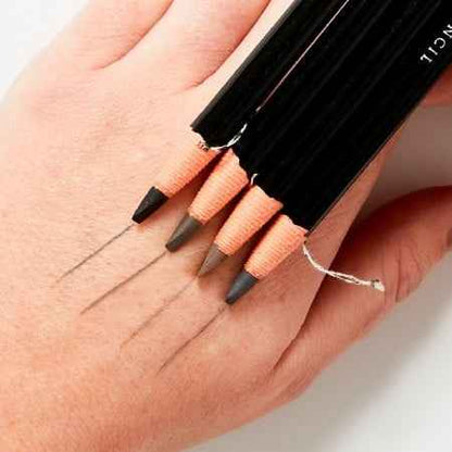 Brow art pencils  on a hand