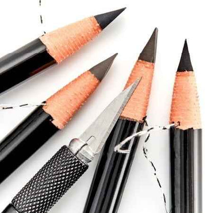 Set of black brow pencils on a white background